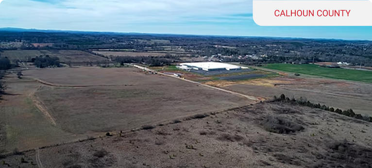 Aerial view of farmland and a large building in Calhoun County